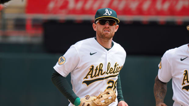 Oakland Athletics OF Billy McKinney runs off field